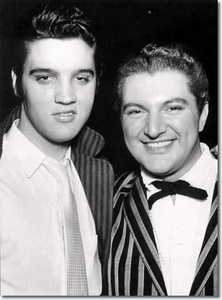  Who is this man in the photograph with Elvis Presley