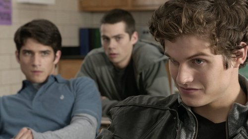 Who are Scott and Stiles looking at in this scene.