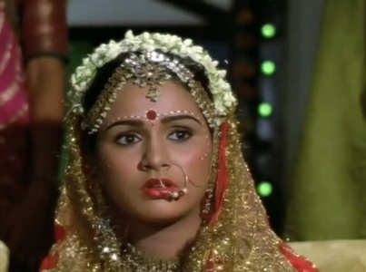  Name this actress, in a scene from the movie Prem Rog?