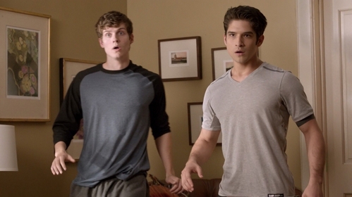  Who are Scott and Isaac looking at in this scene.