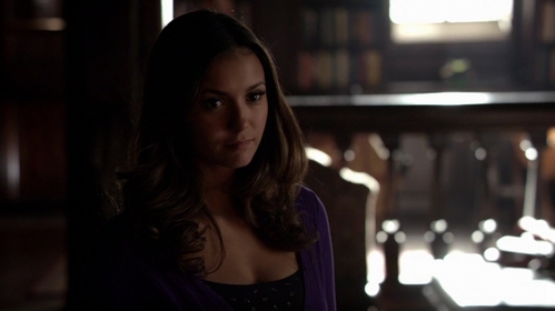  Why does Elena want to go to 1903 Prison World in "A Bird in a Gilded Cage" (6x17)?