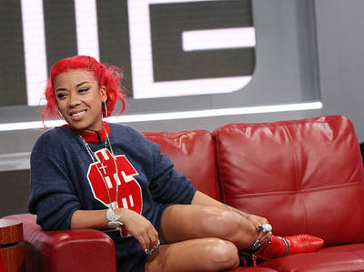 How old was Keyshia Cole when she was first introduced to the music industry?