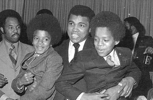  Who is this man in the photograph with Michael and Marlon