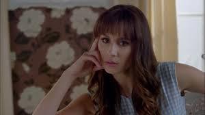 Whose face did Alex run her finger on when she was looking through the foto album at Spencer's house?