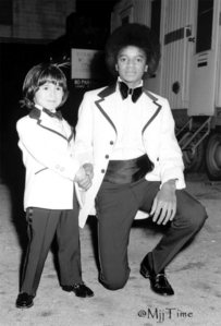  Who is this young boy in the photograph with Michael