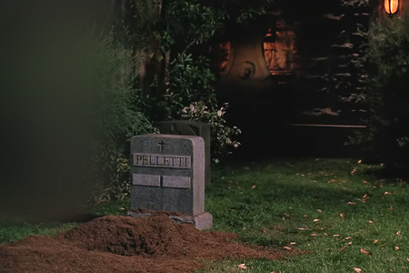 What sort of statue is Weiter to the Pelletti grave in S07E01 Lessons?