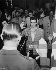  Elvis Presley being sworn in the U. S. Army back in 1958