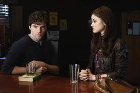 What did Spencer tell Aria the correct answer was to the question about the brand of pen Ezra liked?