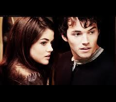  What did Ezra say to Aria after he was shot?