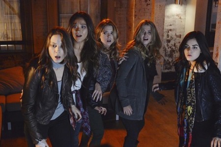  What did Alison say to Aria, Hanna, Spencer, and Emily as she was being arrested?