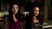 What did Spencer say as Aria was looking through the file?