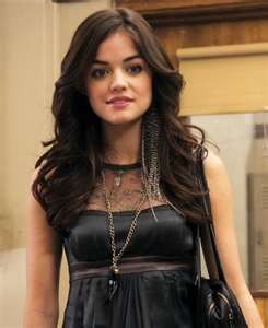 Which of her parents did Aria open up to about her time in the dollhouse?