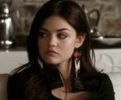 How long did Aria say she was away from Rosewood and being followed A?