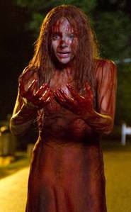 What kind of blood was used to dump on Carrie?