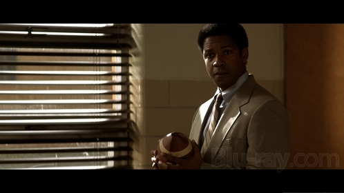 What role did Denzel Washington play in “Remember the Titans”?