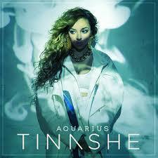 What song on Tinashe’s “Aquarius” album starts off with a woman speaking French?