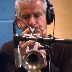 As a session musician, Jerry Hey had collaborated with recording assists such as Michael Jackson and Johnny Mathis 