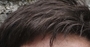 Who's hair is this?