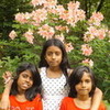 me and my 2 little sisters in a really cool place yeah baby i ma the taller one in the middle tamilnna photo