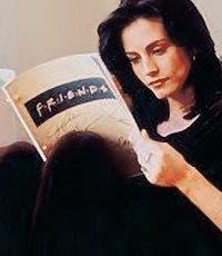 Monica reading FRIENDS