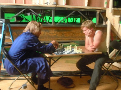  Peeta and Haymitch playing chess