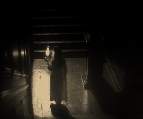  Mary walking down haunted staircase at night