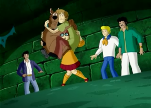 Velma Holding Shaggy and Scooby