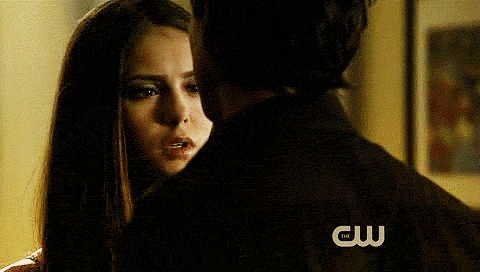 Damon kisses her forehead