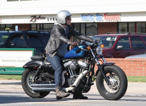 Josh rides his motorcycle through town [19.11.2012]