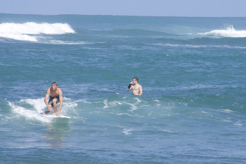  Josh Hutcherson and Sam Claflin surfing in Hawaii