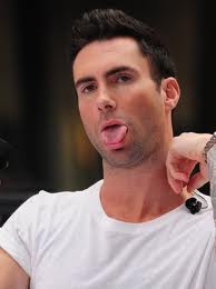  Adam Levine sicking his tongue out