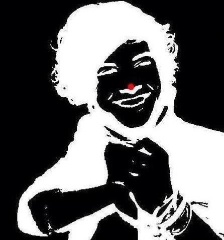 OK so look at the dot for 20 seconds and then look at a blank wall...your welcome. :)