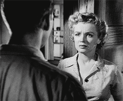  Marilyn Monroe and Keith Andes in “Clash door night”, 1952
