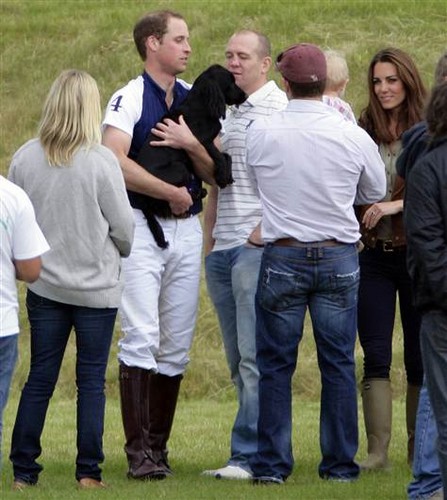  From left, Zara Phillips, Prince William (carrying his dog Lupo