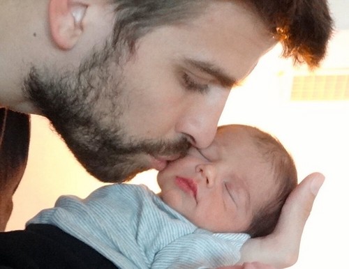  Piqué with his son Milan