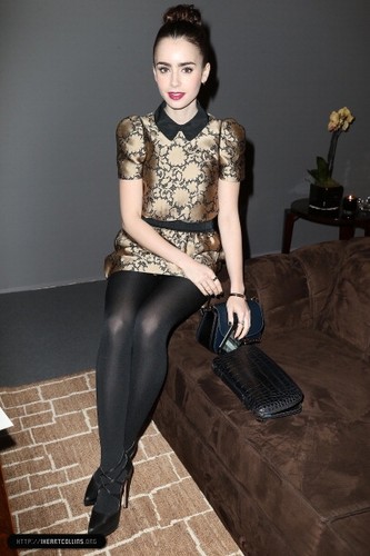  Lily attends the Louis Vuitton Fall/Winter tampil during Paris Fashion Week [06/03/13]
