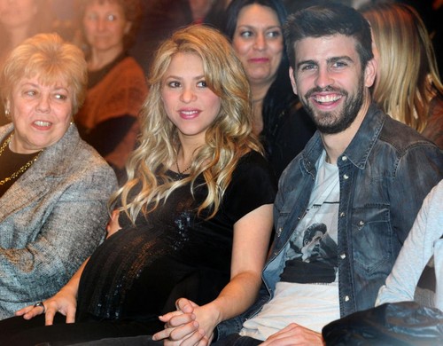  Shakira pregnant belly translucent chemise 2