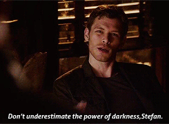 Professor Mr. Mikaelson lecturing his students.