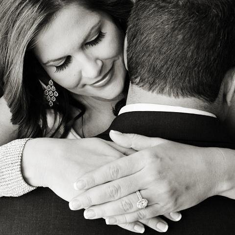 Kristen Cornett with husband Steve Knapp showing off her engagement ring
