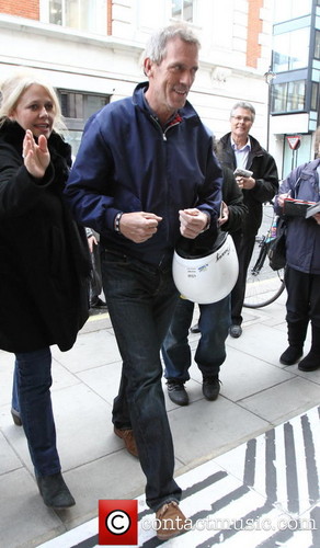  Hugh Laurie seen arriving at Radio 2 for the Simon Mayo show. - London, United Kingdom -17.04.2013