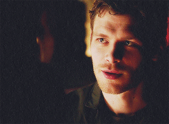  Klaus and Caroline looking at each other.