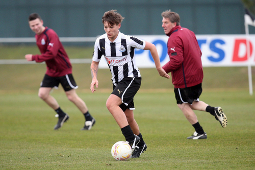 Louis playing football <3