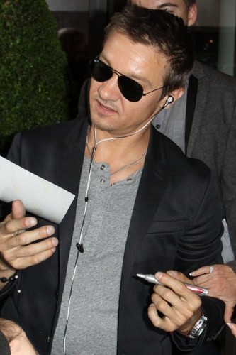  Signing autographs in London