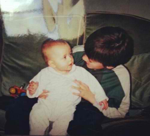 Felicite with her brother when she was little