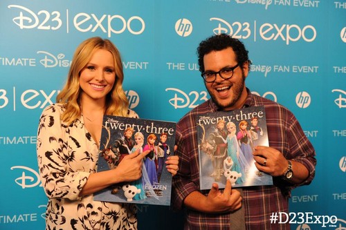  Kristen klok, bell and Josh Gad with their characters on the cover of Disney Magazine