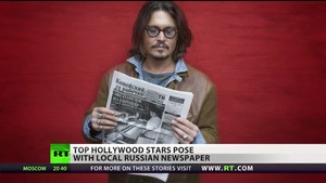  Johnny poses with local Siberian newspaper ( September 2013 )
