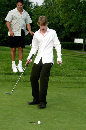  Mac playing golf