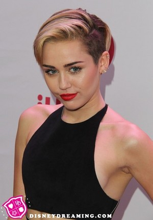  Miley wearing black two piece outfit