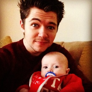  Damian holding his nephew Noah