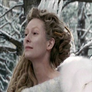  Jadis waits for Edmund to sit beside her